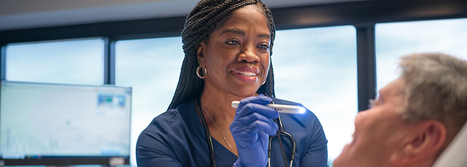 utmc staff caring for a patient