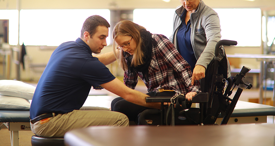 Resident Helping Patient