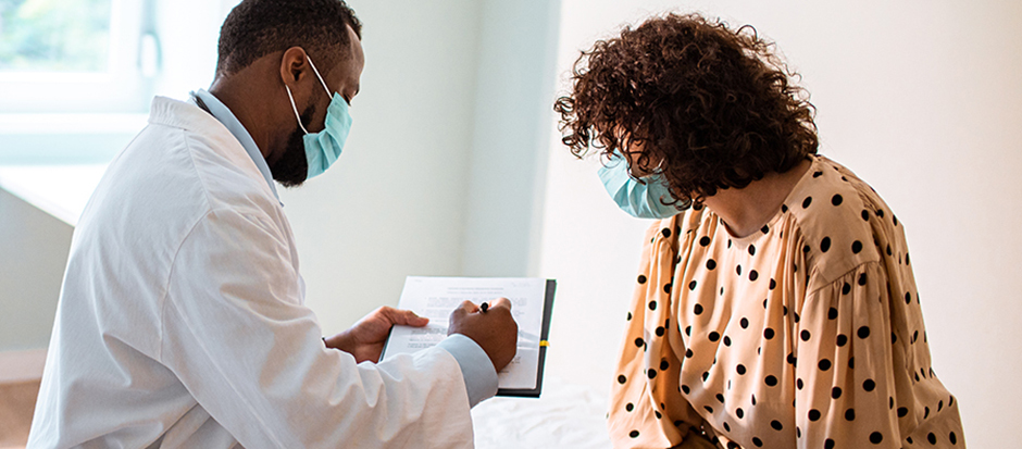 Confident my doctor is in tune with my needs. (Photo of doctor with patient.)